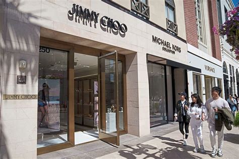 michael kors bankrupt|US sues to block merger of Coach and Michael Kors  .